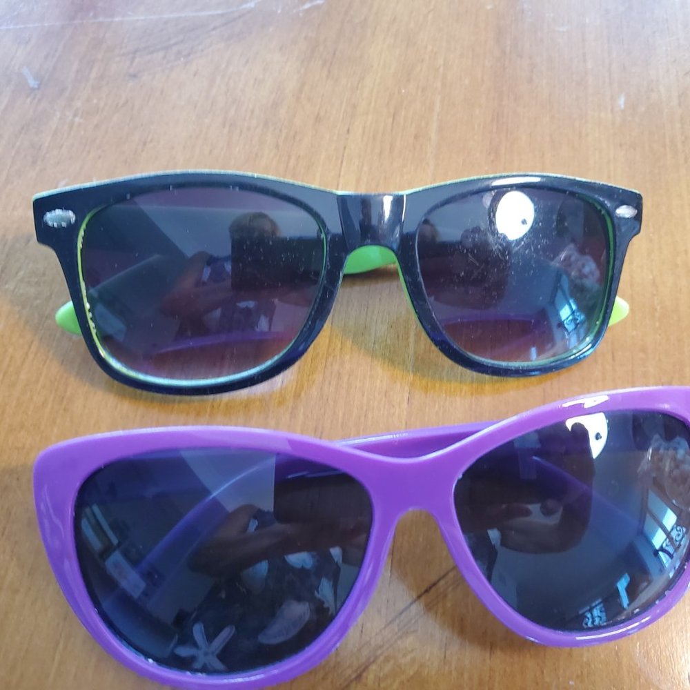 Two Pairs Of Sunglasses
